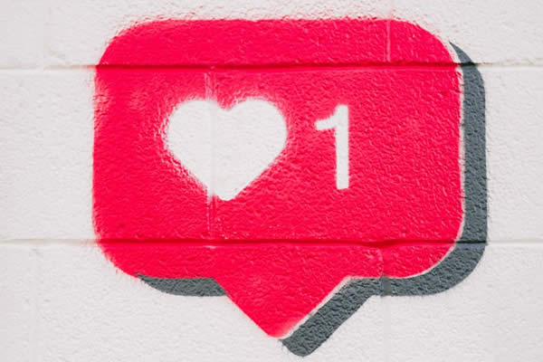 Instagram Like Emoji Spray Painted on a Wall.
